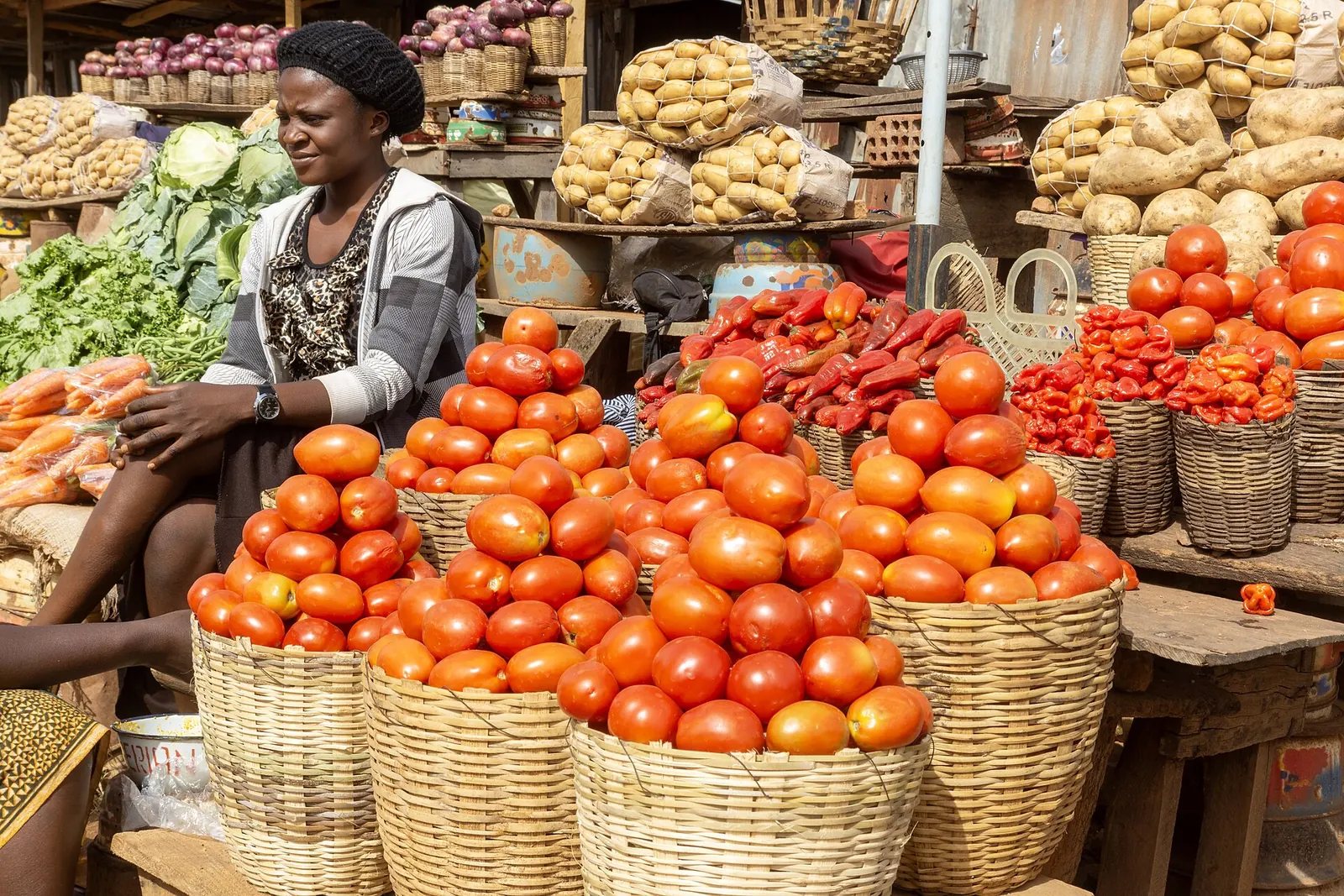 A market trader selling fresh produce